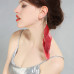  Red Exaggerated Feather Ear Charm